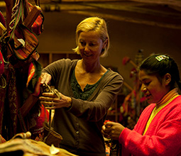 Tourist buying handicrafts in Cusco